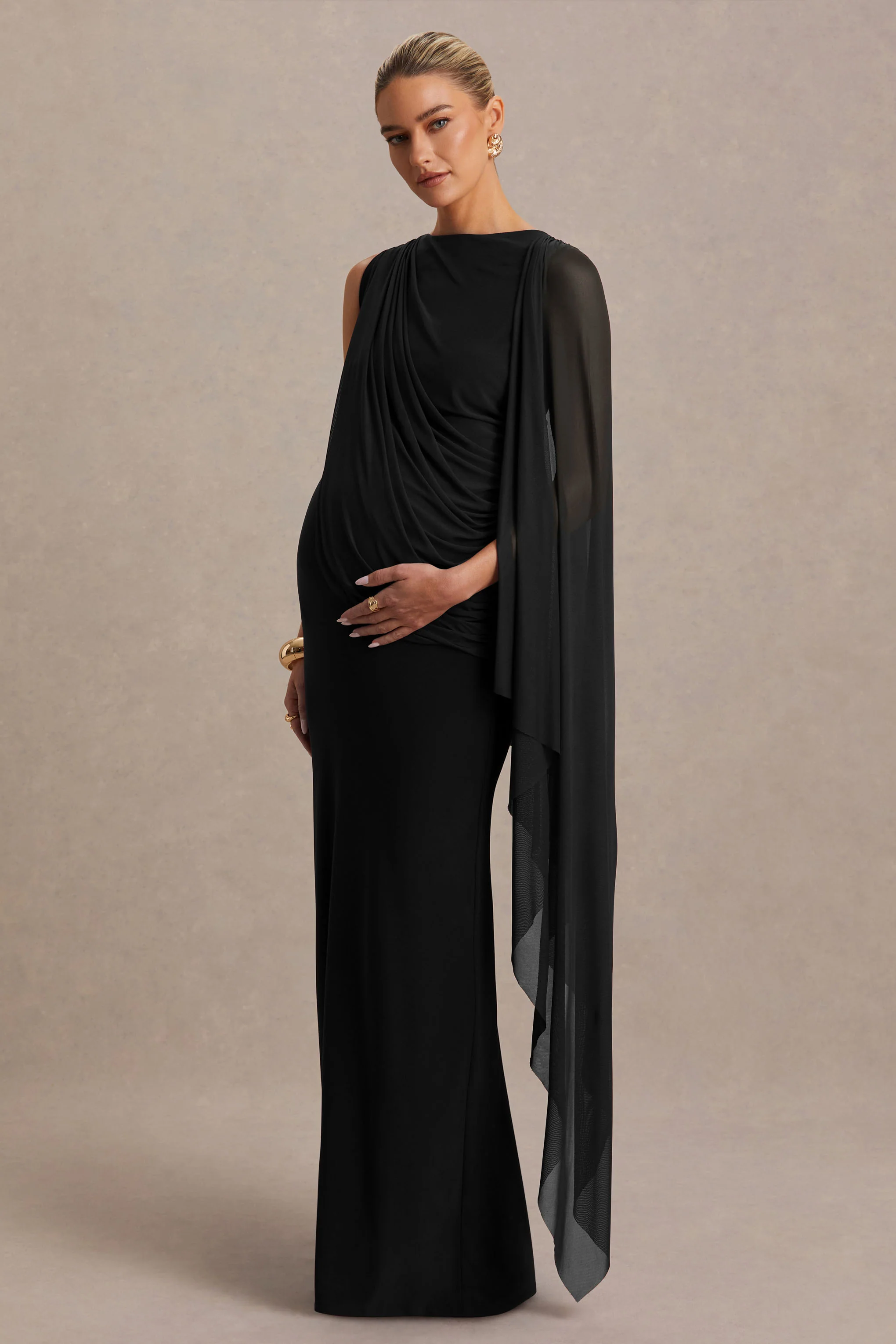 Cristina | Robe longue de maternité noire à encolure haute avec manche-cape