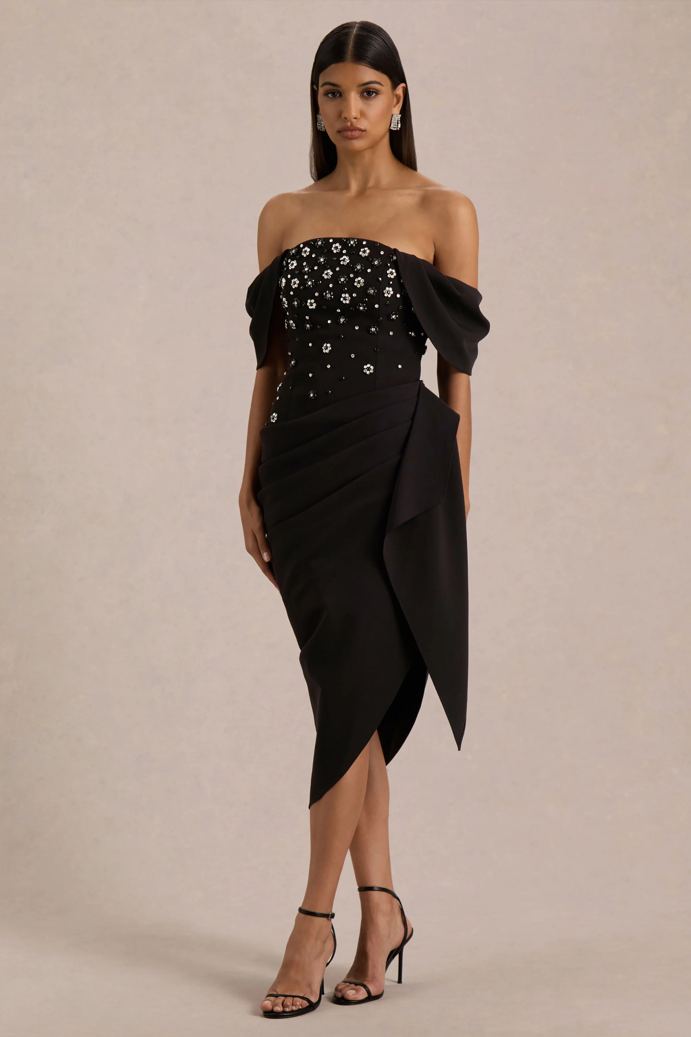 Sylvia | Robe mi-longue noire à encolure bardot ornée à la main avec jupe portefeuille drapée en satin