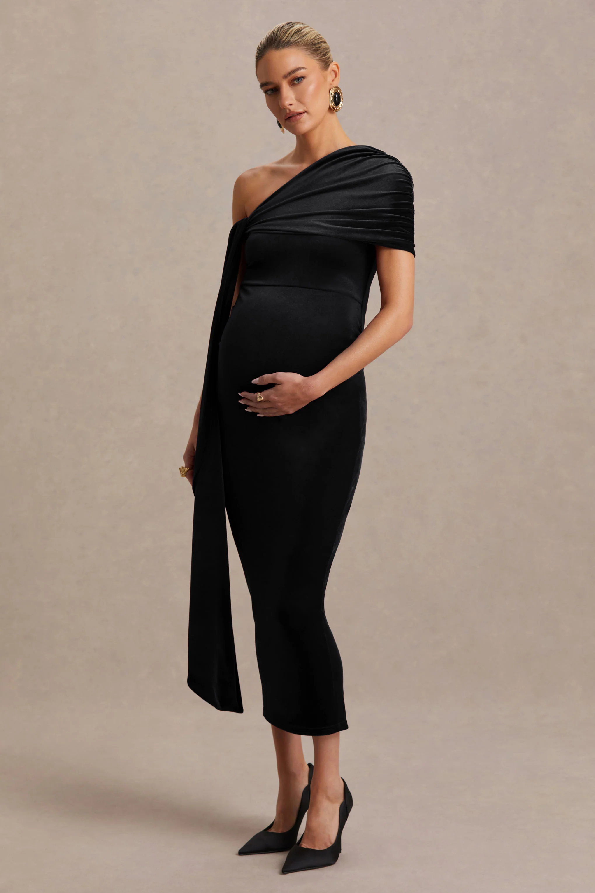 Zena | Robe mi-longue de maternité en velours noir à encolure asymétrique avec détail noué et ceinture